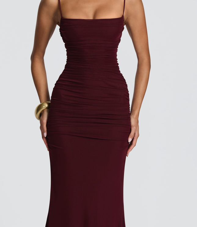 Burgundy ruched maxi dress closeup with spaghetti straps and straight neckline