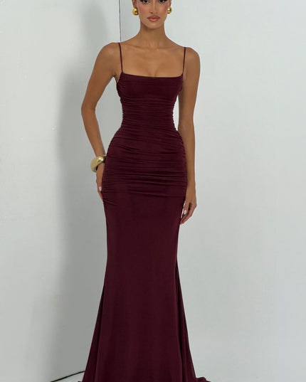 Burgundy ruched maxi dress full length front view with straight neckline and train