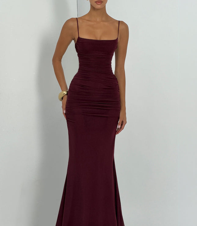 Burgundy ruched maxi dress full length front view with straight neckline and train