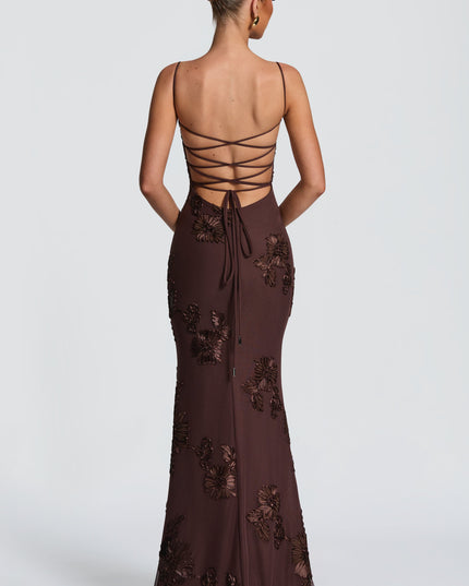 Chocolate brown lace maxi dress back view with crisscross straps and long tie at waist