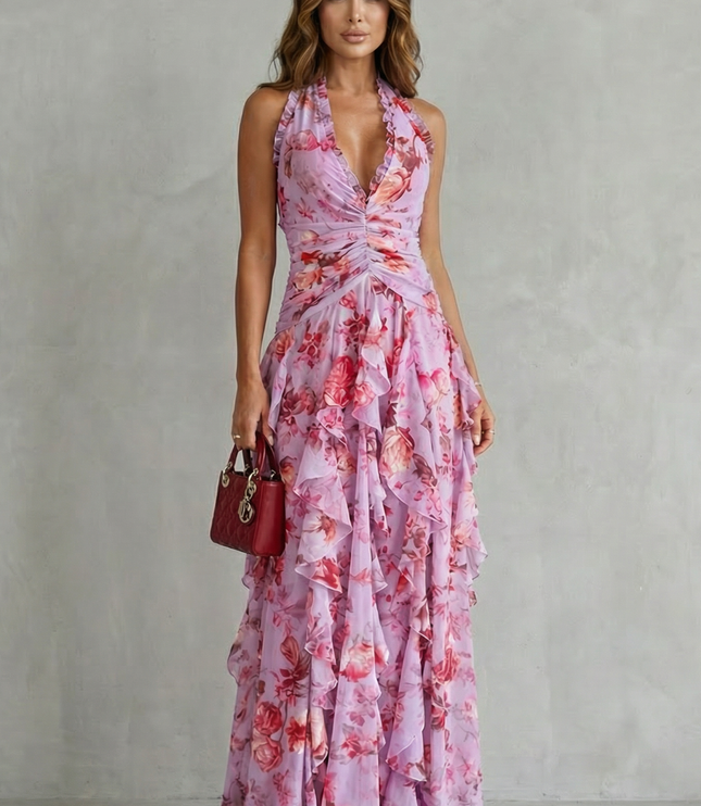 Full-length lilac floral halter maxi dress featuring ruffled neckline, ruched bodice, and tiered skirt