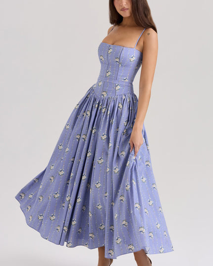 Lavender floral corset midi dress with spaghetti straps and gathered skirt, front three-quarter view