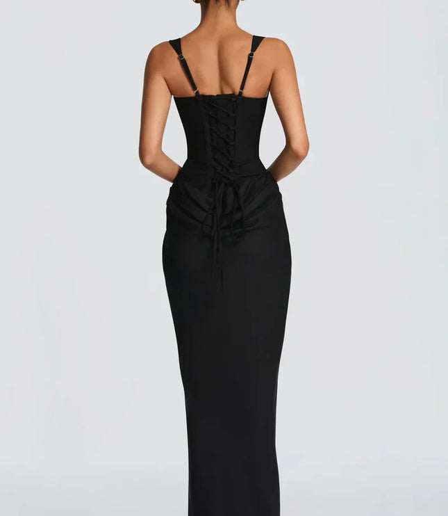 Back view of black square neck corset maxi dress with lace-up corset back and floor-length skirt