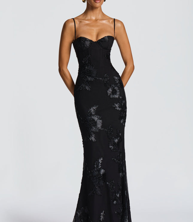 Black lace maxi dress with floral appliqué and sweetheart bustier neckline, front view
