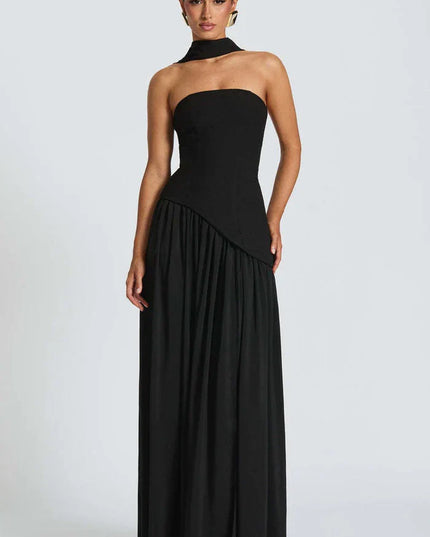 Front view of black halter maxi dress with fitted bodice and floor-length flowing skirt