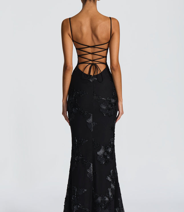 Black lace maxi dress back view with crisscross lace-up straps and fitted mermaid skirt