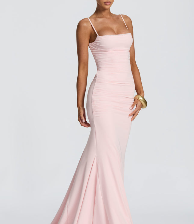Blush pink maxi dress back view with lace-up open back and ruched skirt detail, summer dress