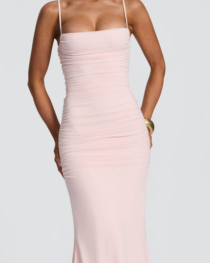 Closeup of blush pink ruched maxi dress bodice with straight neckline and thin straps detail