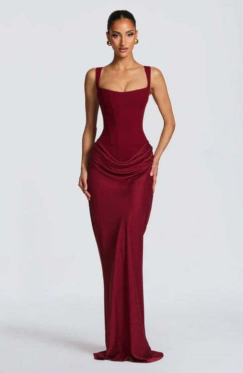 Burgundy square neck corset maxi dress with sculpted bodice and soft draped hip detail