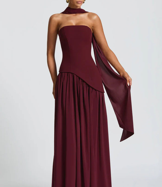 Burgundy halter maxi dress with strapless bodice, draped scarf tie, and full skirt