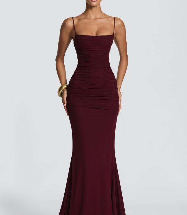 Burgundy ruched maxi dress with spaghetti straps and straight neckline, front view formal dress