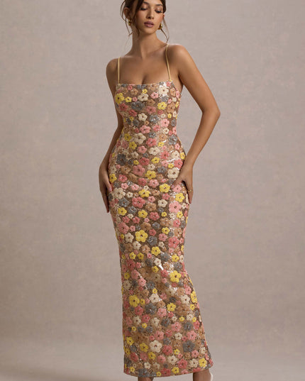 Champagne floral sequin maxi dress with fitted silhouette and thin straps, angled front view