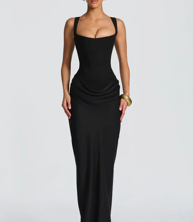 Chocolate brown square neck corset maxi dress worn indoors with draped skirt and fitted waist front view