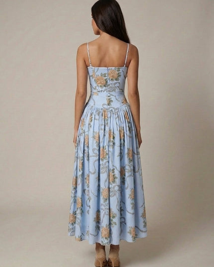 Back view of light blue floral corset midi dress with fitted waist and gathered skirt