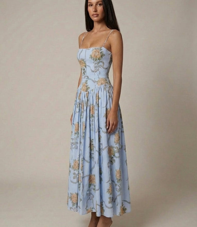 Light blue floral corset midi dress with structured bodice and flowy skirt, side angle view