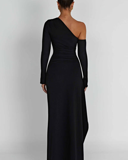Back view of the black asymmetric one-shoulder long sleeve maxi dress, highlighting its sleek design.