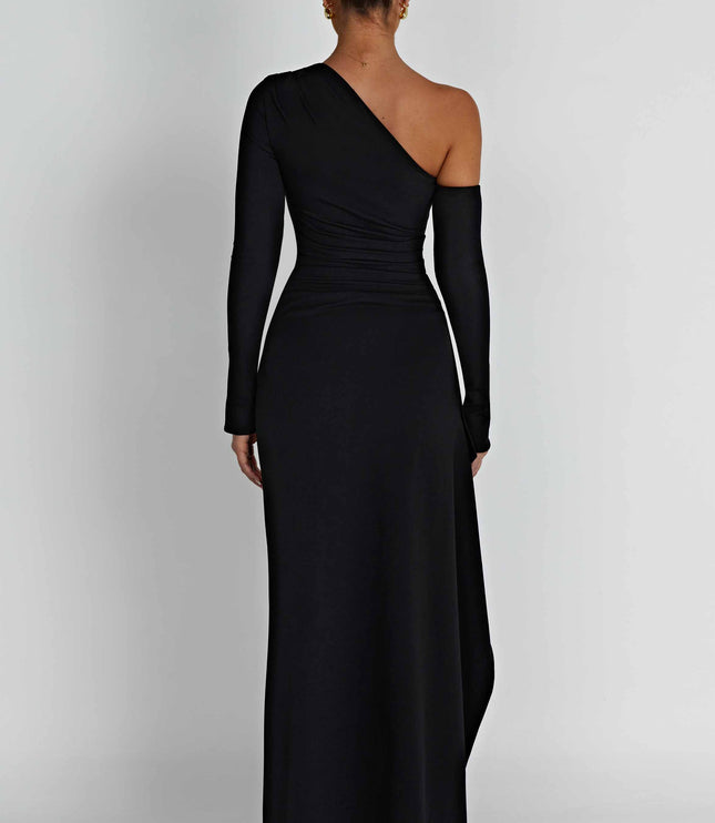 Back view of the black asymmetric one-shoulder long sleeve maxi dress, highlighting its sleek design.