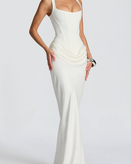 Full-length view of a white square neck draped corset maxi dress, emphasizing the clean lines and sophisticated design.