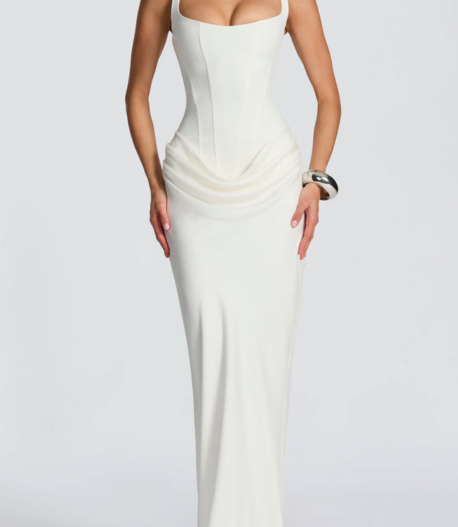Front view of a white square neck draped corset maxi dress for women, featuring a fitted bodice and flowing skirt.