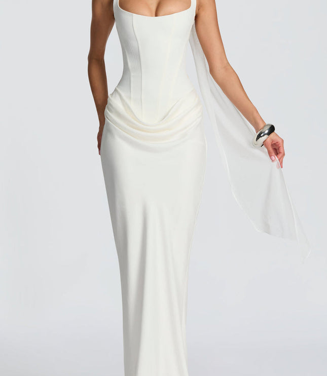 White square neck corset maxi dress for women, styled with a sheer white scarf draped around the neck.