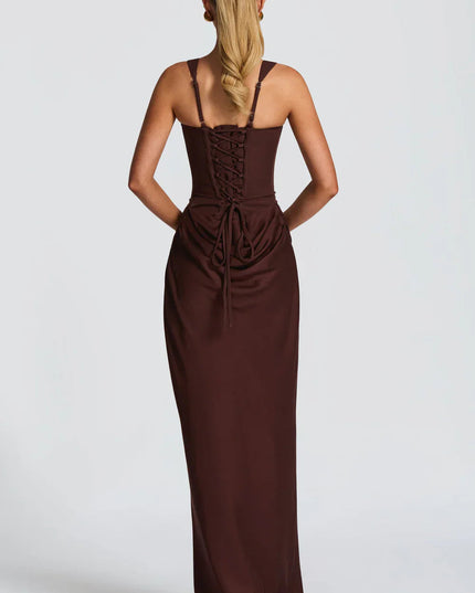 Back view of a women's black square neck draped corset maxi dress, featuring a lace-up back detail.