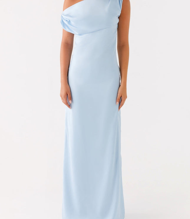 Front view of a light blue satin maxi dress, showcasing the sleek silhouette and one-shoulder draped neckline, suitable as a bridesmaid dress.