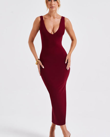Full front view of a women's burgundy plunge neck midi dress, sleeveless, with a fitted design and subtle accessories.