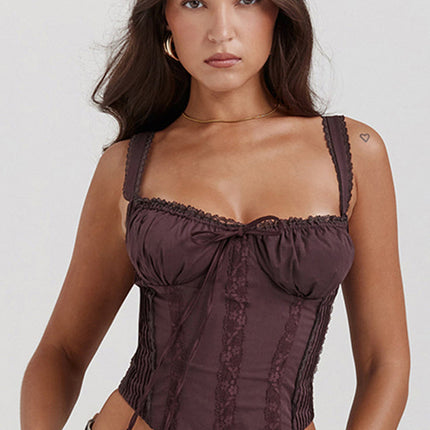 Front view of a dark brown bustier lace-up corset crop top with delicate lace trim on the straps and neckline, featuring a tie-front detail.