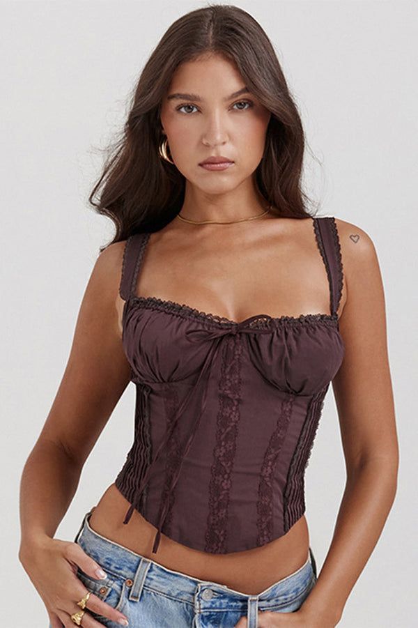 Front view of a dark brown bustier lace-up corset crop top with delicate lace trim on the straps and neckline, featuring a tie-front detail.