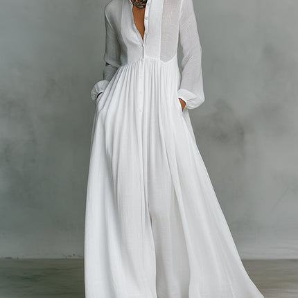 White button-down stand collar jumpsuit with lantern sleeves and wide legs, featuring gathered waist and pockets.