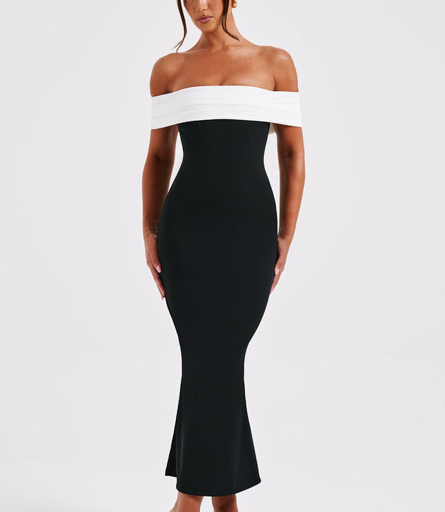 Front view of women's black cocktail midi dress with white off-shoulder pleated detail and black open-toe heels.