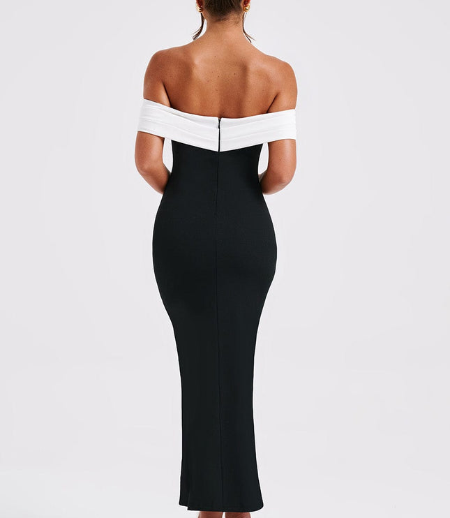 Rear view of the women's black midi dress with white off-shoulder design, showcasing the full length and fitted back.