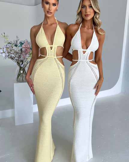 Full-length shot of two women in the light yellow and white crochet knit plunge halter maxi dresses, showing both color options.