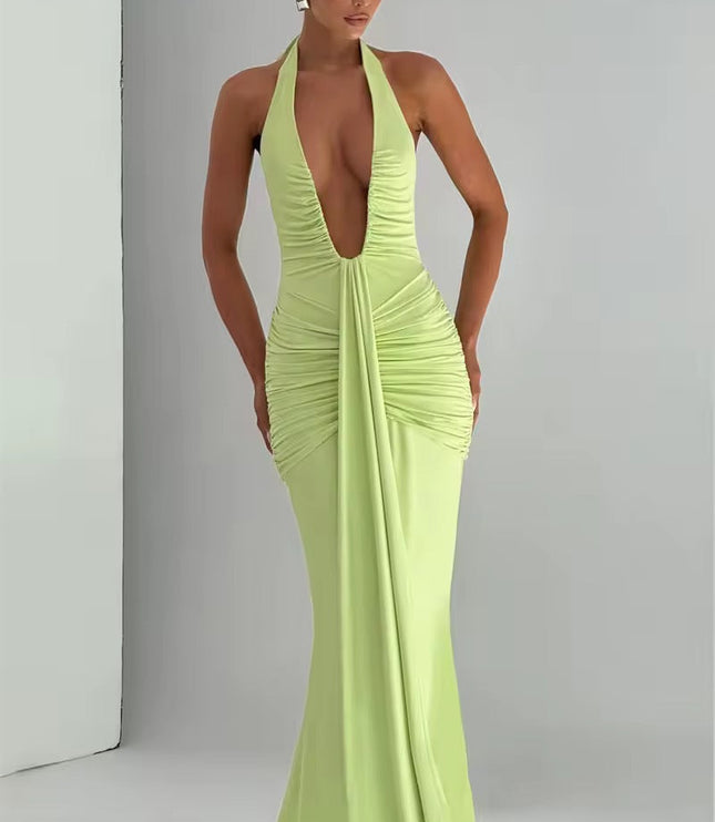 Light green deep V halter ruched mermaid maxi dress, with a dramatic deep V-neck and ruched details along the body.