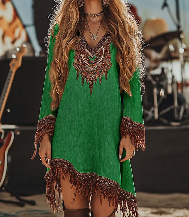 Women's emerald green embroidered V-neck long sleeve mini dress, detailed with brown fringe on the hem and sleeves.