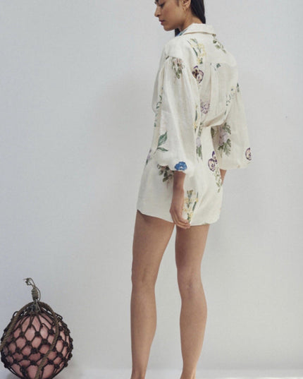 Back view of women's floral balloon sleeve button-down top and matching shorts, showcasing the full design.