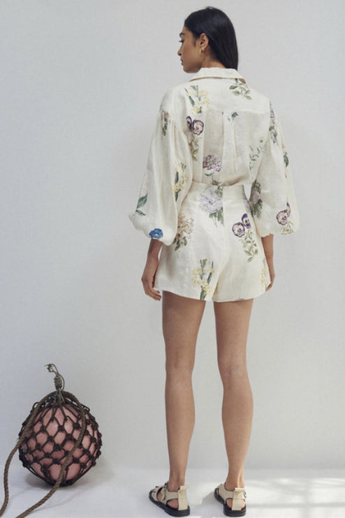 Rear view of the women's floral linen short set, displaying the continuous floral pattern on the top and shorts.