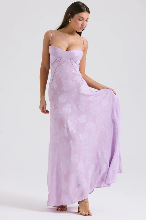 Women's floral corset maxi dress in delicate lavender, featuring a sweetheart neckline and subtle floral pattern.