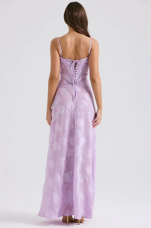 Rear view of women's lavender floral corset maxi dress, displaying the intricate lace-up back design.
