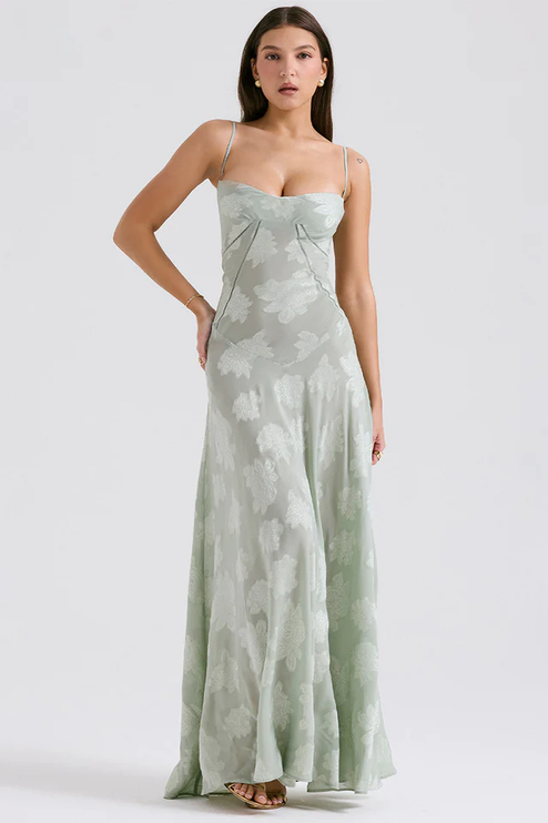 Full-length women's floral corset maxi dress in light sage green with spaghetti straps and sweetheart neckline.
