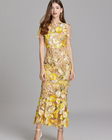 Women's yellow and white floral embroidered sheer maxi prom dress, short sleeves, with a natural stance.