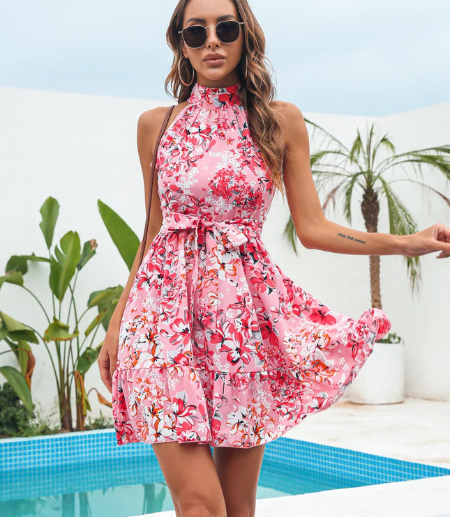 Pink floral halter neck tiered mini dress with a high neckline and a silhouette.