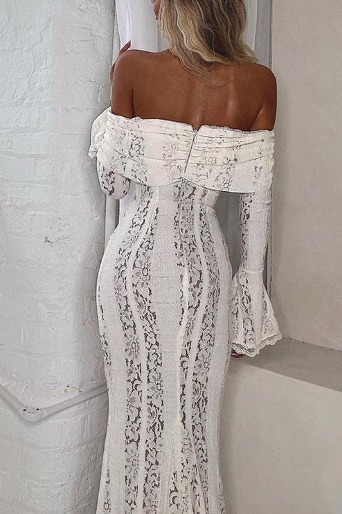Back view of the white floral lace off-shoulder long sleeve maxi dress, highlighting the fitted silhouette and ruffled neckline.
