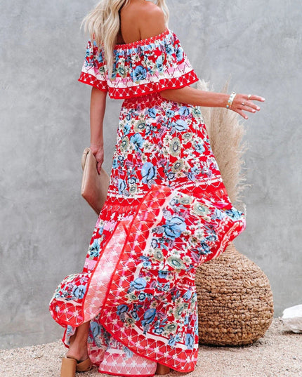 Dynamic shot of a red floral off-shoulder ruffled maxi dress with blue flowers, flowing gracefully in motion.