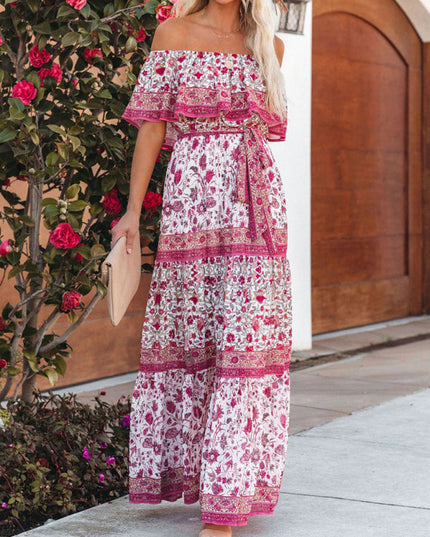 White and fuchsia floral off-shoulder ruffled maxi dress with a matching tie belt and tiered skirt design.