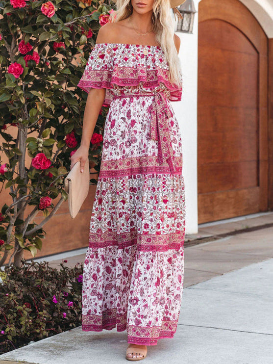 White and fuchsia floral off-shoulder ruffled maxi dress with a matching tie belt and tiered skirt design.