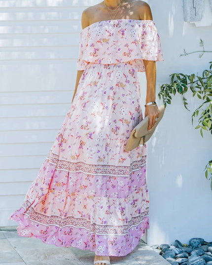 Flowing light pink floral off-shoulder ruffled maxi dress with a tiered skirt, for spring.