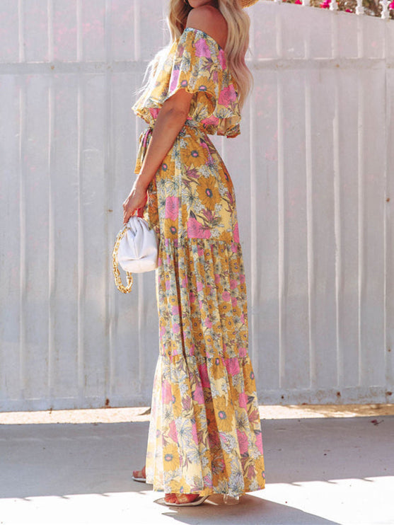 Side view of the yellow floral off-shoulder ruffled maxi dress, showing the full length and tiered skirt details.