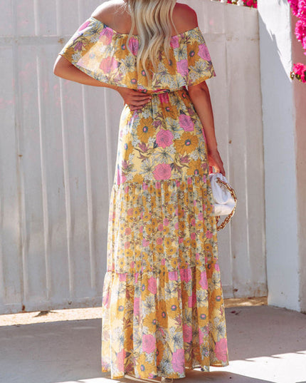 Back view of the yellow floral off-shoulder ruffled maxi dress, showcasing the vibrant sunflower print and tiered design.