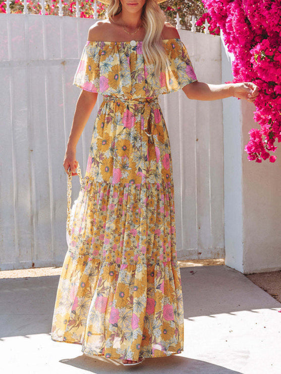 Women's off-shoulder ruffled floral maxi dress in a vibrant yellow with pink and orange sunflower patterns, for summer.